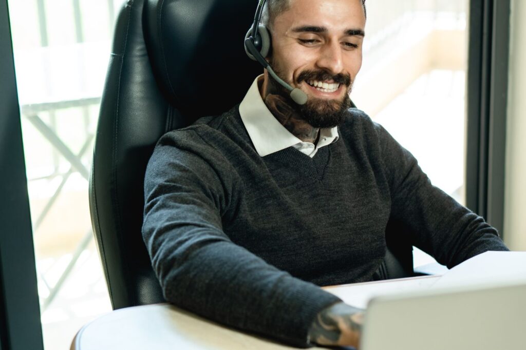 Customer service staff wearing a headset in an office