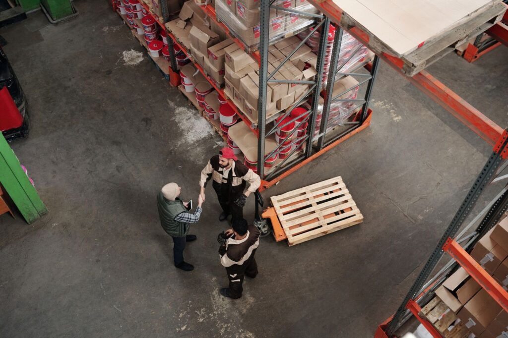 Warehouse workers handling goods for logistics operations